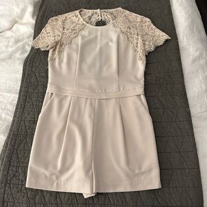 BCBG cream romper, lace sleeves and cutout back, size 0, only worn once